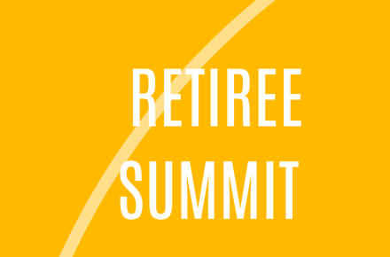 yellow arches with Retiree Summit on it.